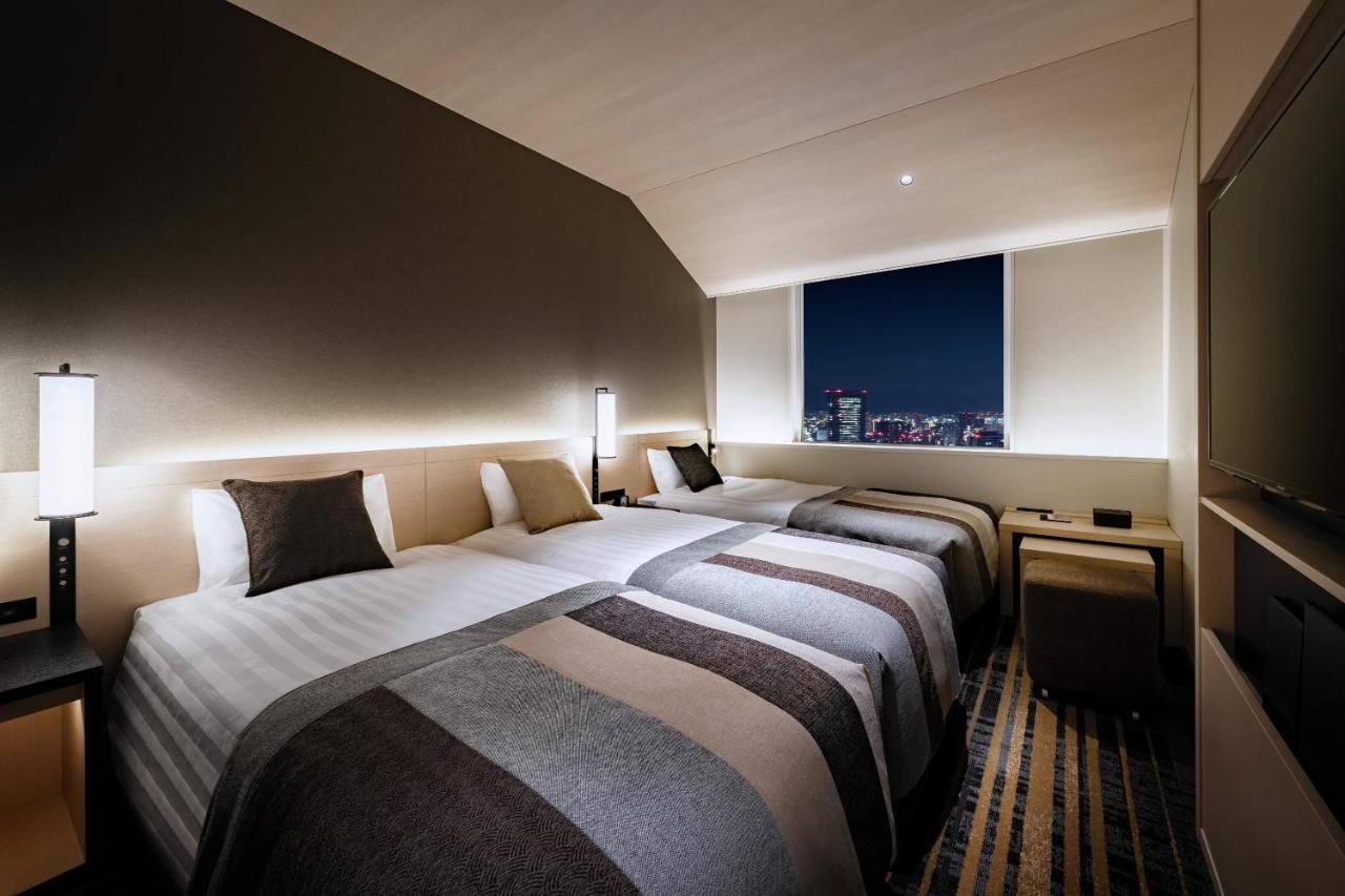 Hotel Hankyu Respire Осака Екстериор снимка